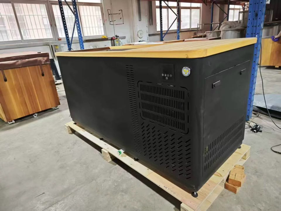 Commercial cold plunge with insulated cover, black cabinet with red cedar top border